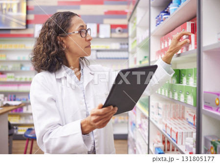 Pharmacy medicine, tablet and pharmacist woman for product management, stock research and inventory. Digital technology, retail logistics and expert, healthcare doctor or person on ecommerce software 131805177