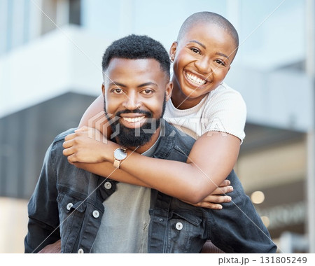Piggyback, black couple and portrait in city for love, care and happiness on date together in Nigeria. Happy man carrying woman in urban street, town and outdoor for fun, freedom and relax with smile 131805249