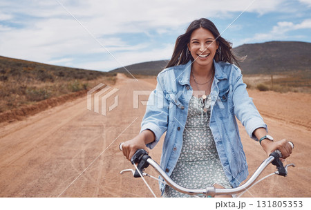 Happy, desert and portrait of a woman on a bike for travel, road trip and adventure in Sweden. Smile, ride and girl riding a bicycle for adventure, journey and traveling in the countryside nature Happy, desert and portrait of a woman on a bike for travel, road trip and adventure in Sweden. Smile, ride and girl riding a bicycle for adventure, journey and traveling in the countryside nature 131805353