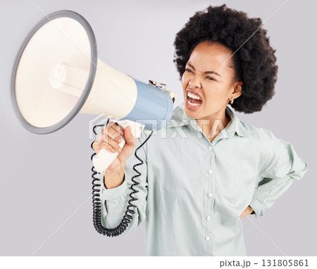 Megaphone, protest and black woman shouting in studio isolated on white background. Screaming, angry and person with loudspeaker protesting for human rights, change or justice, announcement or speech Megaphone, protest and black woman shouting in studio isolated on white background. Screaming, angry and person with loudspeaker protesting for human rights, change or justice, announcement or speech 131805861