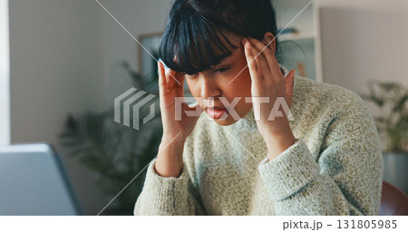 Headache, pain and business woman in home office for remote work. Mental health, burnout and migraine of tired freelancer, stress and frustrated with challenge, financial crisis and fatigue in house 131805985