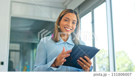Portrait, tablet and a smile with a business woman using an app in her office for research or planning. Technology, data and email with a happy young employee looking at online info in the workplace 131806007