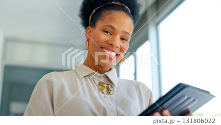 Portrait, tablet and a email with a business black woman in her office for research or planning. Technology, data and networking with a happy young employee looking at information in the workplace Portrait, tablet and a email with a business black woman in her office for research or planning. Technology, data and networking with a happy young employee looking at information in the workplace 131806022
