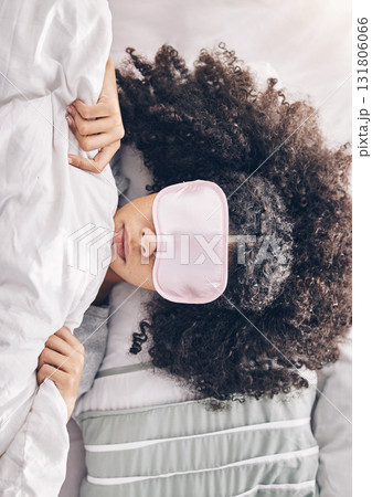 Relax, beauty sleep and black woman with eye mask in bed, dream and refresh body and mind in apartment from above. Dreaming, rest and relaxation, girl sleeping late on weekend morning in cozy bedroom Relax, beauty sleep and black woman with eye mask in bed, dream and refresh body and mind in apartment from above. Dreaming, rest and relaxation, girl sleeping late on weekend morning in cozy bedroom 131806066