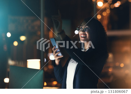 Business woman, phone and night in the office with bokeh lights to work late for project deadline. African American female employee working overtime with smartphone technology in a dark workplace 131806067