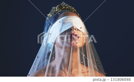 Blindfolded, princess and woman in veil studio for creative, fashion or artistic aesthetic on black background. Model, medieval and crown beauty by girl model in luxury, fabric and elegant clothing Blindfolded, princess and woman in veil studio for creative, fashion or artistic aesthetic on black background. Model, medieval and crown beauty by girl model in luxury, fabric and elegant clothing 131806098