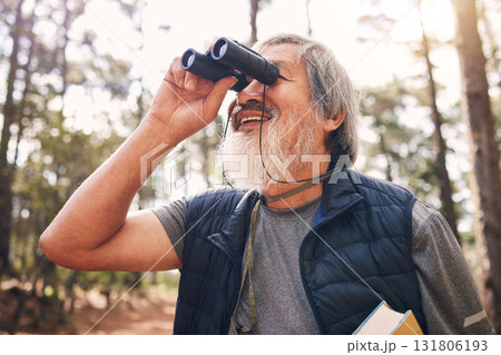 Binoculars, hiking and senior man in nature looking at view, sightseeing or watching. Binocular, adventure search and happy elderly male with field glasses, trekking or exploring on vacation outdoors 131806193