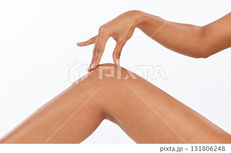 Beauty, epilation and closeup of legs in studio with shaving, hair removal or depilation treatment. Body care, wellness and woman model with moisturizing, skin and health routine by white background. 131806248