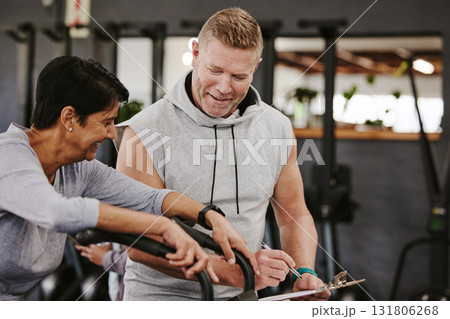 Cardio, personal trainer and senior woman, gym fitness checklist, progress or writing exercise results. Coaching, lose weight and sports professional helping elderly person on running machine workout Cardio, personal trainer and senior woman, gym fitness checklist, progress or writing exercise results. Coaching, lose weight and sports professional helping elderly person on running machine workout 131806268