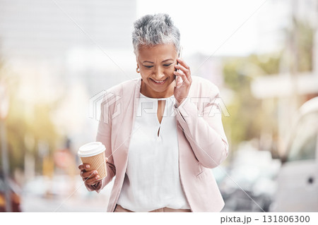 Senior woman, phone call and coffee in the city for communication, conversation or discussion. Happy elderly female smiling on smartphone for 5G connection, talking and walking in a urban town road 131806300