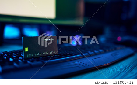 Computer hacking, credit card fraud and financial theft via ransomware, fintech breach or software virus. Password phishing, neon cyber security or banking privacy risk from scam, ransomware or crime 131806412