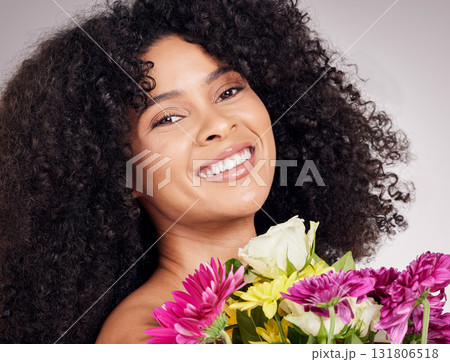 Skincare or face of black woman or flowers in studio for body wellness, luxury spa or self care. Aesthetic, beauty facial portrait or girl with plants for treatment, cosmetics product or nature Skincare or face of black woman or flowers in studio for body wellness, luxury spa or self care. Aesthetic, beauty facial portrait or girl with plants for treatment, cosmetics product or nature 131806518