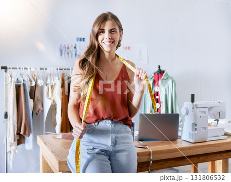 Clothes, designer and startup business woman portrait in the fashion industry happy about success. Tailor, creative workshop studio and seamstress manager ready for fabric textile measuring job Clothes, designer and startup business woman portrait in the fashion industry happy about success. Tailor, creative workshop studio and seamstress manager ready for fabric textile measuring job 131806532
