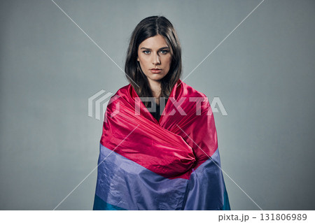 Bisexual flag, pride and woman in portrait, lgbtq and freedom to love, inclusion and equality, protest for human rights. Gay, trans and lesbian identity, politics and community on studio background 131806989
