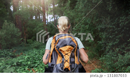 Travel, forest and woman rear on hiking journey, jungle adventure or nature wellness and outdoor explore. Fitness, walking and hiker person in backpack trekking, tropical woods path and cardio health Travel, forest and woman rear on hiking journey, jungle adventure or nature wellness and outdoor explore. Fitness, walking and hiker person in backpack trekking, tropical woods path and cardio health 131807033