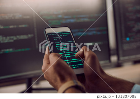 Coding, smartphone in hands and man, programmer and computer software update, information technology and code. Cybersecurity, ux and network with wifi, web design and cyber space with cpu programming 131807088