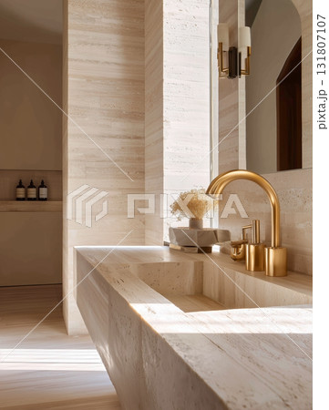 Elegant Bathroom Design Featuring a Golden Faucet and Natural Stone Finishes in Soft Natural Light Elegant Bathroom Design Featuring a Golden Faucet and Natural Stone Finishes in Soft Natural Light 131807107