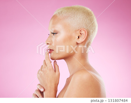 Woman, beauty and makeup in skincare cosmetics for facial or spa treatment against pink studio background. Female face and hands thinking in satisfaction for luxury cosmetic or perfect skin on mockup Woman, beauty and makeup in skincare cosmetics for facial or spa treatment against pink studio background. Female face and hands thinking in satisfaction for luxury cosmetic or perfect skin on mockup 131807484