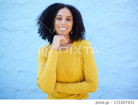 Portrait, proud and black woman in studio on mockup, space and blue background for advertising. Face, smile and girl relax on backdrop, cheerful and confident, cool and posing inside on copy space Portrait, proud and black woman in studio on mockup, space and blue background for advertising. Face, smile and girl relax on backdrop, cheerful and confident, cool and posing inside on copy space 131807832