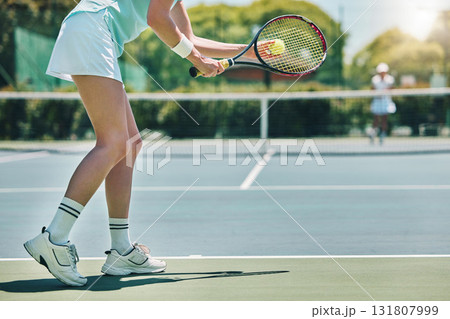 Tennis serve, sports and woman with legs on outdoor court, fitness motivation and competition with athlete training. Workout, healthy and player on turf, active with sport and exercise with action 131807999