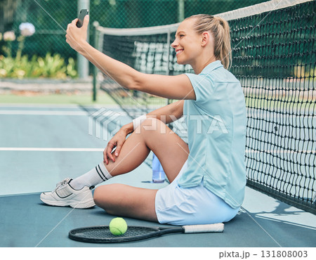 Tennis, woman and selfie at court during training, fitness and morning routine outdoors. Sports, girl and smartphone photo before match, performance or exercise, workout and smile for profile picture 131808003