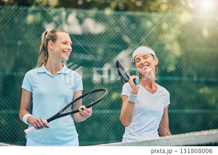 Tennis, women friends and sports on outdoor court for fitness, exercise and training. Healthy people or team talking at club about game, workout and performance for health and wellness with cardio Tennis, women friends and sports on outdoor court for fitness, exercise and training. Healthy people or team talking at club about game, workout and performance for health and wellness with cardio 131808006