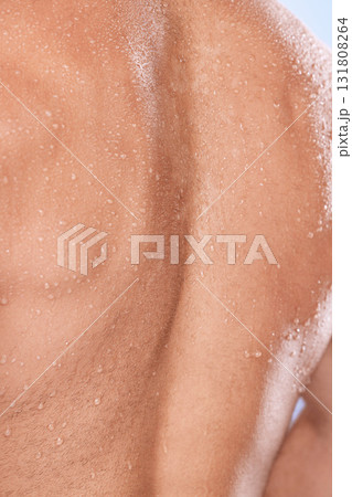 Water drops, back closeup and man for shower, fitness and skincare hygiene for cosmetics, health and dermatology. Shoulder, body zoom and person with workout, exercise or sports muscle training sweat Water drops, back closeup and man for shower, fitness and skincare hygiene for cosmetics, health and dermatology. Shoulder, body zoom and person with workout, exercise or sports muscle training sweat 131808264