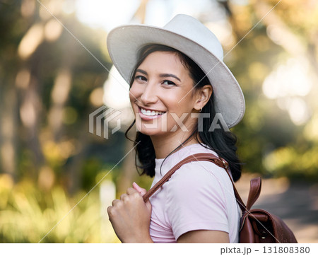 Woman smile, portrait and park walk of a young person happy about nature, travel and freedom. Happiness, backpack and laughing female with blurred background in a garden feeling relax and summer fun Woman smile, portrait and park walk of a young person happy about nature, travel and freedom. Happiness, backpack and laughing female with blurred background in a garden feeling relax and summer fun 131808380