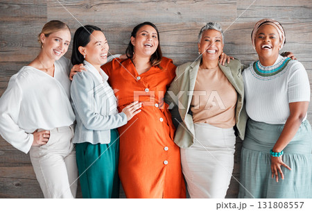 Happy, smile and portrait of a pregnant woman with her friends by a wood wall at her baby shower. Friendship, diversity and females supporting, loving and bonding with a lady with pregnancy together. Happy, smile and portrait of a pregnant woman with her friends by a wood wall at her baby shower. Friendship, diversity and females supporting, loving and bonding with a lady with pregnancy together. 131808557