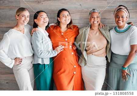 Happy, friends and portrait of a pregnant female with women by a wood wall at her baby shower. Friendship, diversity and group of ladies supporting, loving and bonding with pregnancy together. 131808558