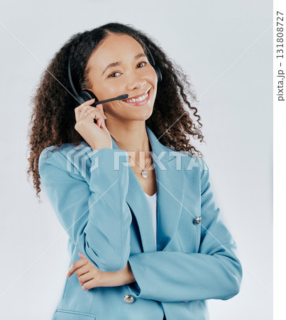 Business woman, portrait smile and call center with headset mic for telecom customer service against white studio background. Happy isolated female consultant agent smiling with headphones for advice Business woman, portrait smile and call center with headset mic for telecom customer service against white studio background. Happy isolated female consultant agent smiling with headphones for advice 131808727