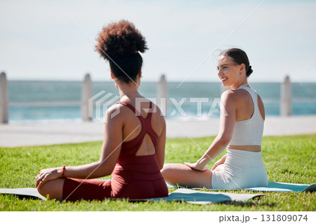 Yoga, park and young couple of friends or women for zen fitness, exercise and mindfulness, healing and support. Pilates training, workout people talking of health and body wellness together at beach 131809074