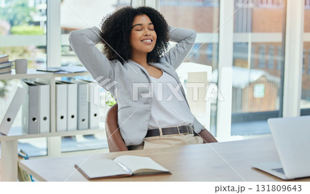 Happy business woman stretching at desk for relax, career success and work life balance in her office. Professional worker or biracial person calm, confident and peace for project time management Happy business woman stretching at desk for relax, career success and work life balance in her office. Professional worker or biracial person calm, confident and peace for project time management 131809643