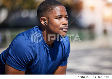 Fitness, break and man runner relax with music before training, running or morning cardio outdoors. Sports, pause and male athlete breathing, mindset and preparation for marathon practice workout run Fitness, break and man runner relax with music before training, running or morning cardio outdoors. Sports, pause and male athlete breathing, mindset and preparation for marathon practice workout run 131809646