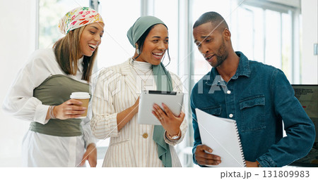 Tablet, documents and coffee with laughing business people together in an office as work friends. Technology, strategy and funny game plan with a man and woman employee group in the workplace Tablet, documents and coffee with laughing business people together in an office as work friends. Technology, strategy and funny game plan with a man and woman employee group in the workplace 131809983