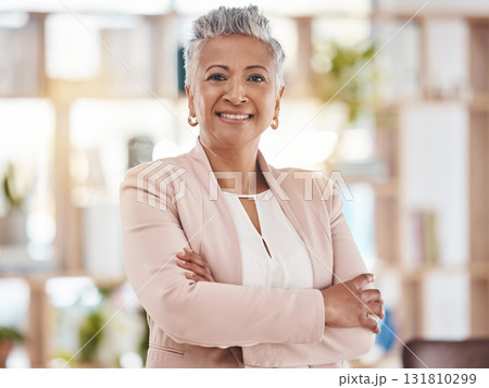 Portrait, business and woman with arms crossed in office, corporate company and management in Colombia. Business executive, mature female and smile for leadership, professional trust or vision of ceo 131810299