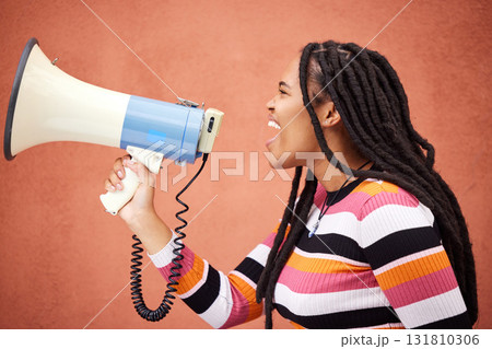 Megaphone, protest or angry black woman with speech announcement for politics, equality or human rights. Young feminist leader, stop or loud gen z girl shouting for justice or help on wall background Megaphone, protest or angry black woman with speech announcement for politics, equality or human rights. Young feminist leader, stop or loud gen z girl shouting for justice or help on wall background 131810306