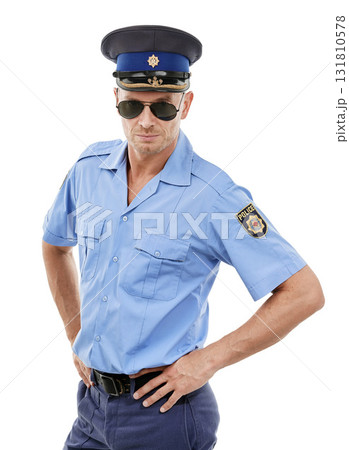 Officer, security and portrait of police on white background for authority, public safety and crime. Justice, law enforcement and isolated policeman, traffic cop and guard with hands on hip in studio 131810578