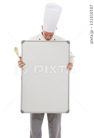 Chef man with mockup board isolated on a white background for empty menu and culinary career services. Professional cooking or bakery person with whiteboard, presentation and ideas in studio mock up 131810587