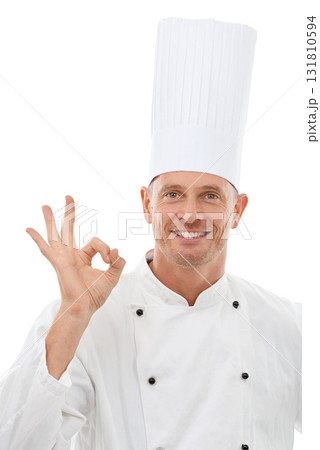 Man, chef and OK hand sign with smile for perfection, approval or precision isolated on a white studio background. Portrait of happy culinary artist showing gesture for perfect, precise or like emoji 131810594