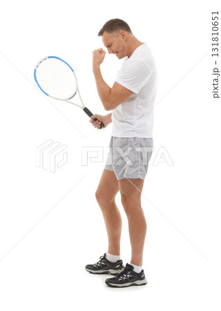 Winner, tennis sports and celebration of man in studio isolated on white background for exercise. Winning, achievement or mature male athlete with racket celebrating goals, targets or success victory Winner, tennis sports and celebration of man in studio isolated on white background for exercise. Winning, achievement or mature male athlete with racket celebrating goals, targets or success victory 131810651