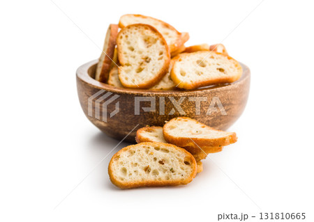 Crispy roasted bruschetta bread isolated on white background. Crispy roasted bruschetta bread isolated on white background. 131810665