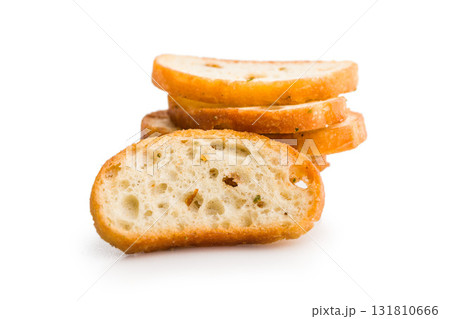 Crispy roasted bruschetta bread isolated on white background. Crispy roasted bruschetta bread isolated on white background. 131810666