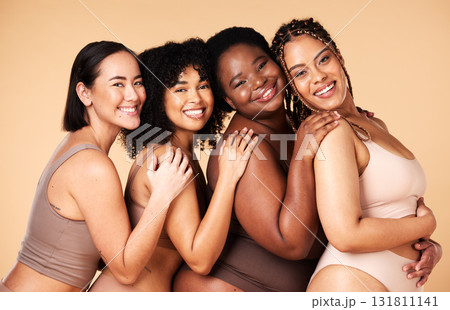 Skin care, portrait and diversity women group together for inclusion, natural beauty and power. Happy plus size model friends on beige background for support, makeup glow and underwear body self love 131811141