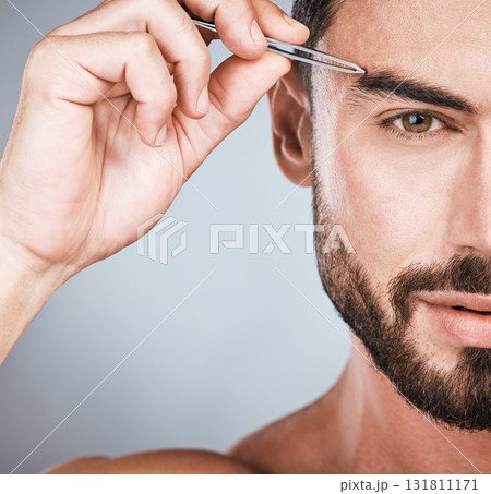 Portrait, man and tweezers for eyebrows, cosmetics and morning routine with guy on grey studio background. Face care, male and gentleman with skincare, beauty and hair removal for grooming and facial Portrait, man and tweezers for eyebrows, cosmetics and morning routine with guy on grey studio background. Face care, male and gentleman with skincare, beauty and hair removal for grooming and facial 131811171