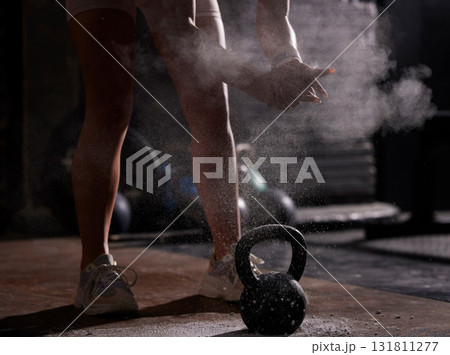 Fitness, man or exercise with kettlebell, powder or bodybuilding for wellness, energy or healthy lifestyle. Male, guy or athlete with gym equipment, heavy weight or mindset for training or chalk dust Fitness, man or exercise with kettlebell, powder or bodybuilding for wellness, energy or healthy lifestyle. Male, guy or athlete with gym equipment, heavy weight or mindset for training or chalk dust 131811277