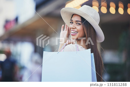 Woman, shopping bag and portrait smile in the city carrying bags for discount, deal or purchase. Happy female shopper smiling in joyful happiness for luxury, fashion gifts or sale in an urban town 131811288
