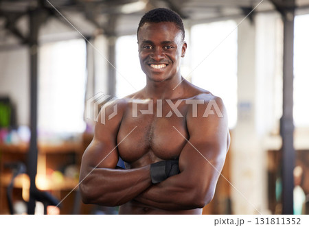 Happy, fitness and portrait of man at gym proud, smile and relax with empowered, mindset and blurred background. Face, bodybuilder and positivity by black guy training, workout and exercise routine Happy, fitness and portrait of man at gym proud, smile and relax with empowered, mindset and blurred background. Face, bodybuilder and positivity by black guy training, workout and exercise routine 131811352