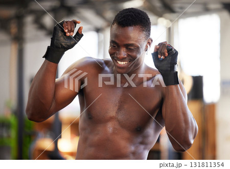 Fitness, man and dance for gym, success and body goal victory for training on blurred background. Happy, guy and dancing celebration after workout for performance, exercise and kickboxing milestone Fitness, man and dance for gym, success and body goal victory for training on blurred background. Happy, guy and dancing celebration after workout for performance, exercise and kickboxing milestone 131811354