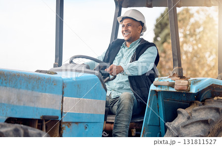 Tractor, man and farmer on field for agriculture, countryside or sustainability in nature. Happy farming worker driving machine truck, transport and sustainable ecology with happiness of land harvest 131811527